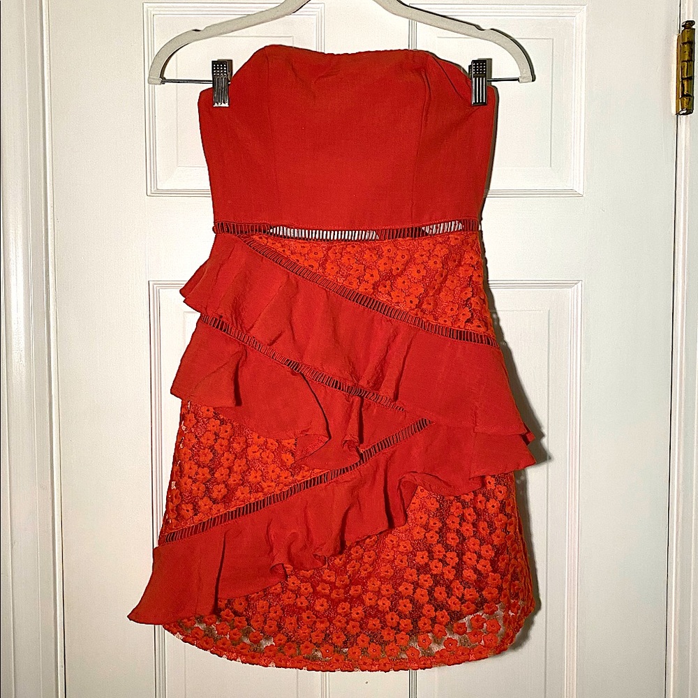 Saints + Secrets—Red strapless tie back dress